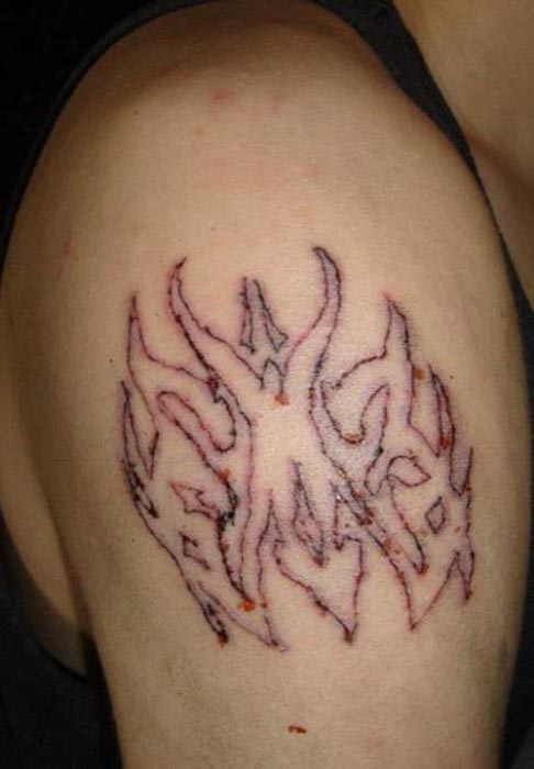 Ίσως ο χειρότερος τατουατζής του κόσμου... (11)